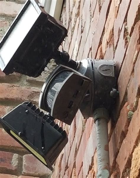 junction box has come loose from brick wall 